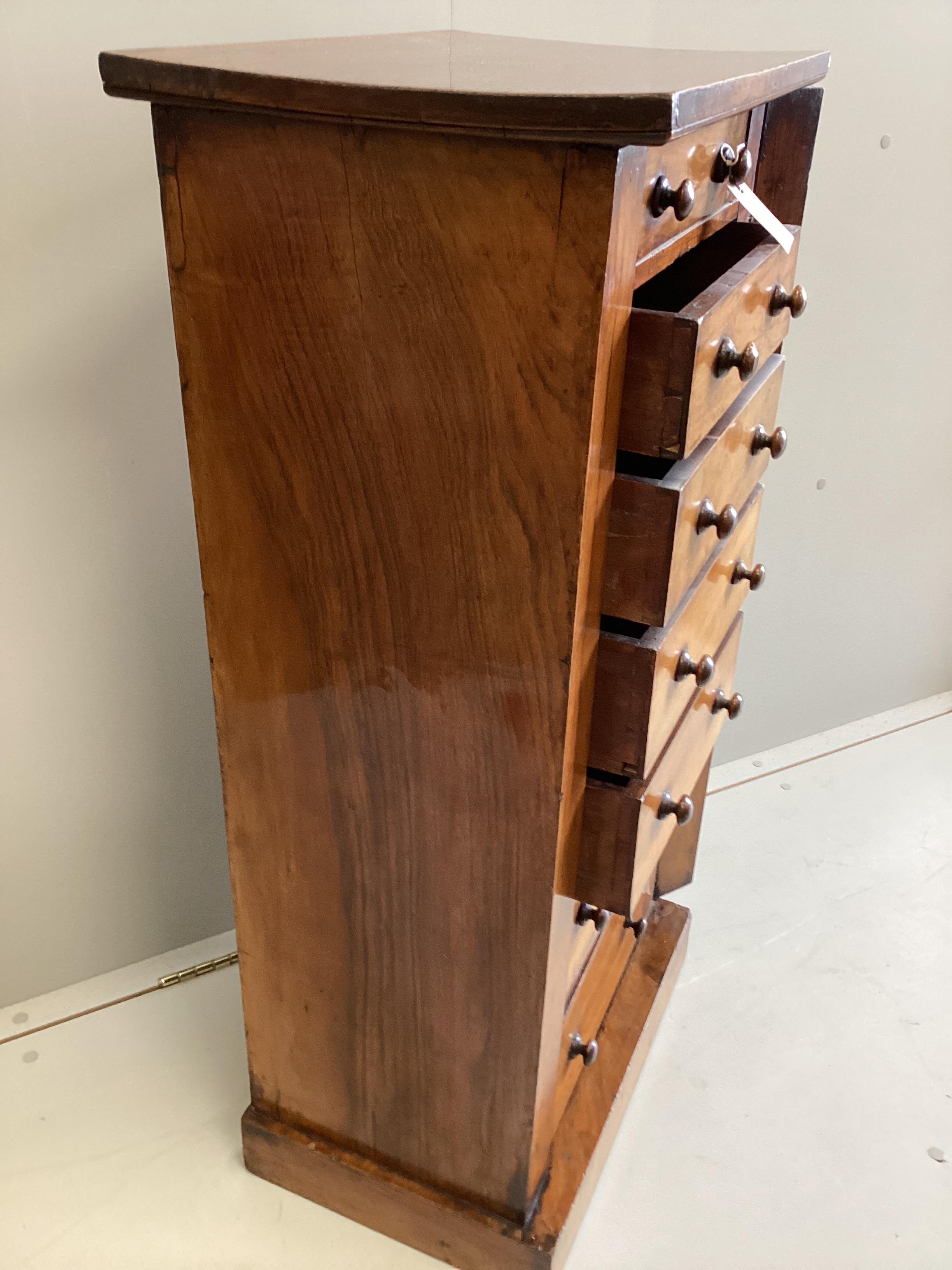 A Victorian figured walnut Wellington chest, width 49cm, depth 34cm, height 100cm